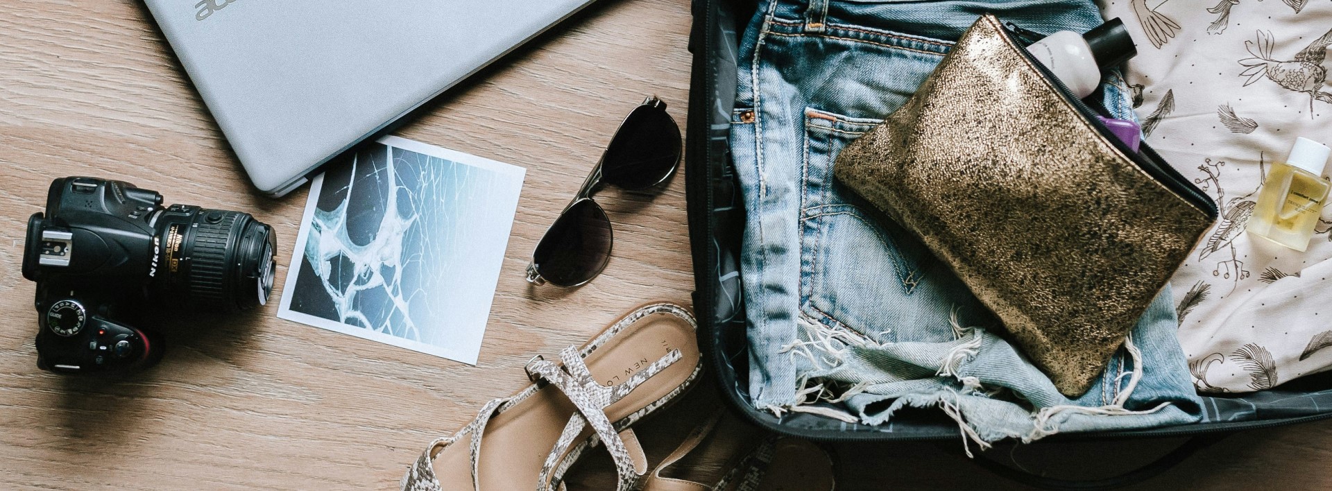 camera, suitcase, sunglasses