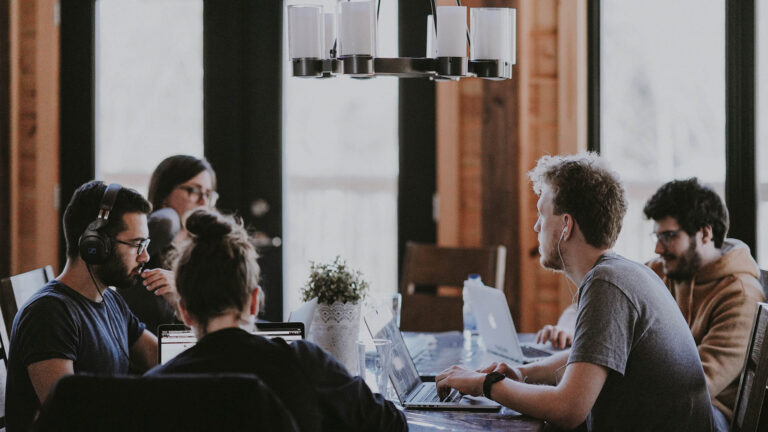 team of people discussing something in a meeting