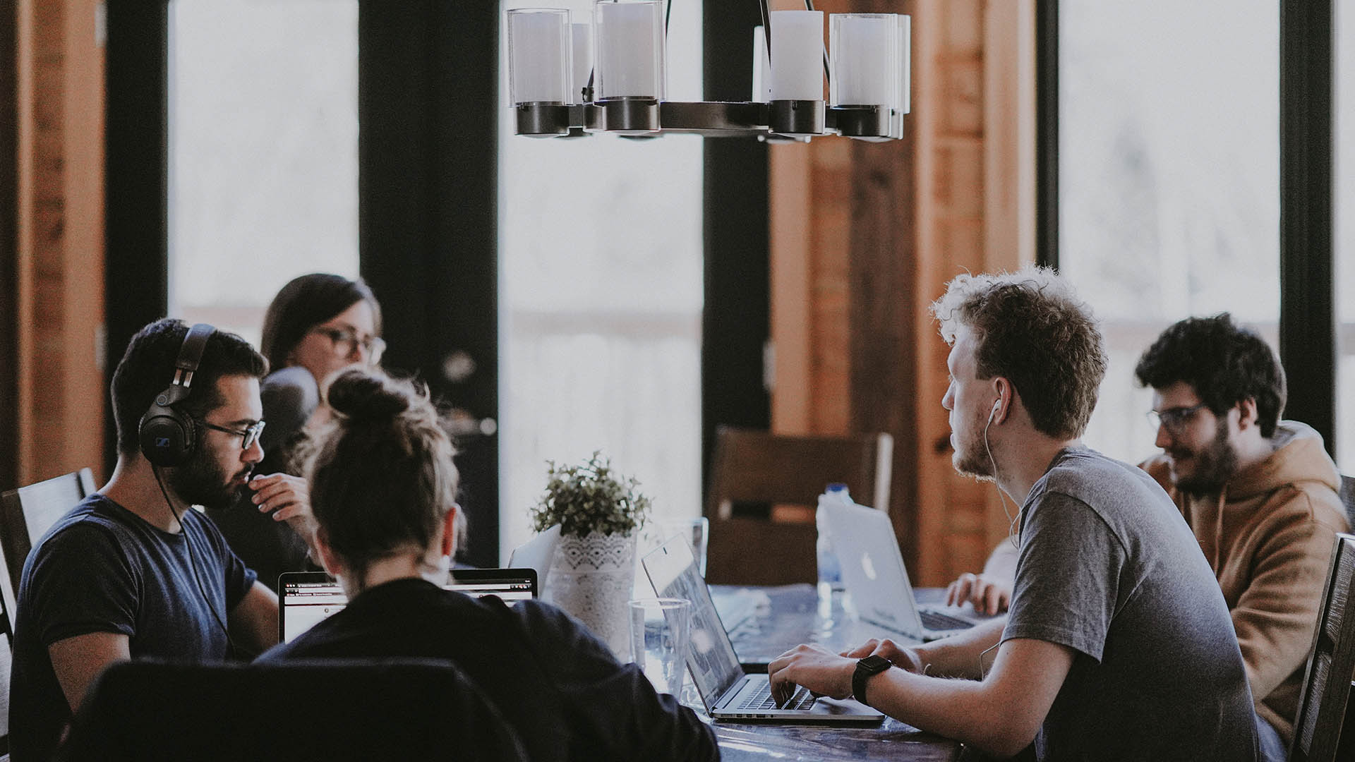 team of people discussing something in a meeting