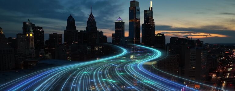 traffic lights in a big city with skyscrapers at night