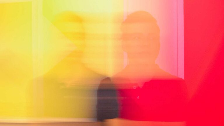 person shadows in yellow and red