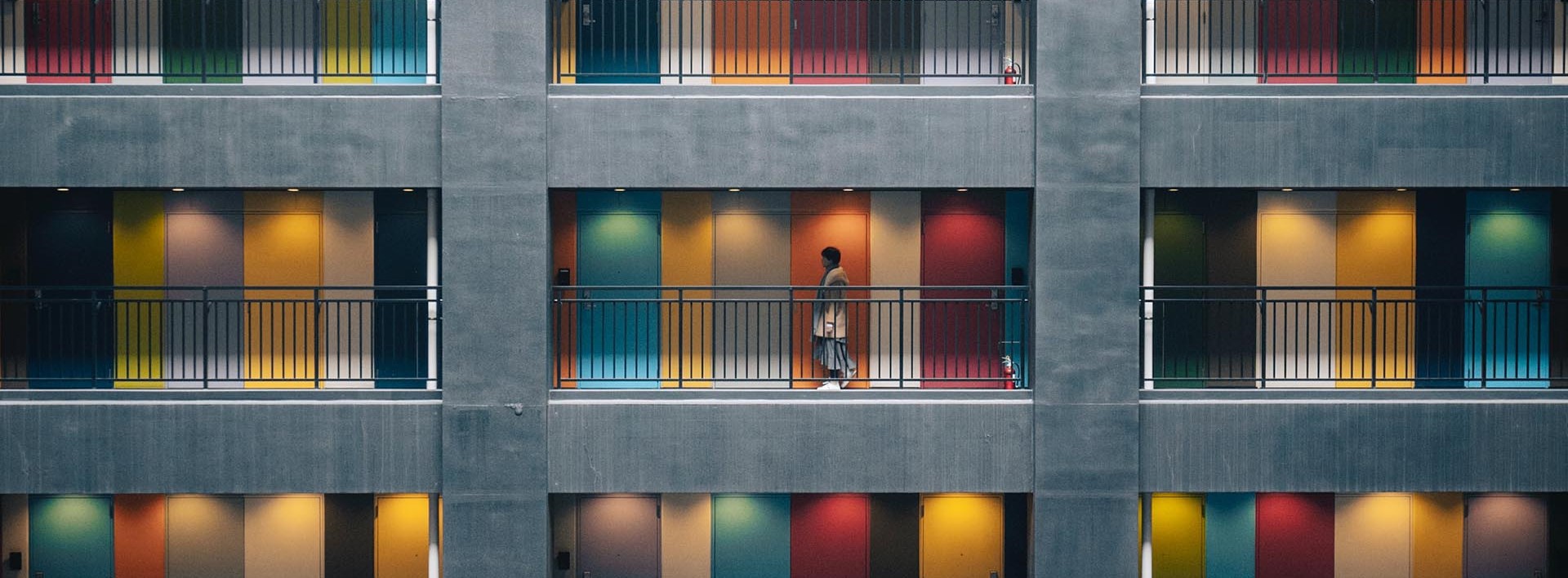 apartments with colourful doors and lights
