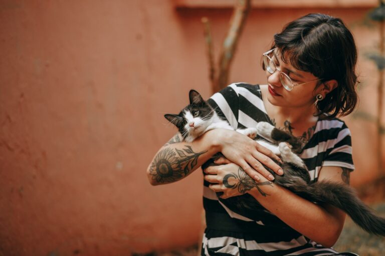 woman holding a cat