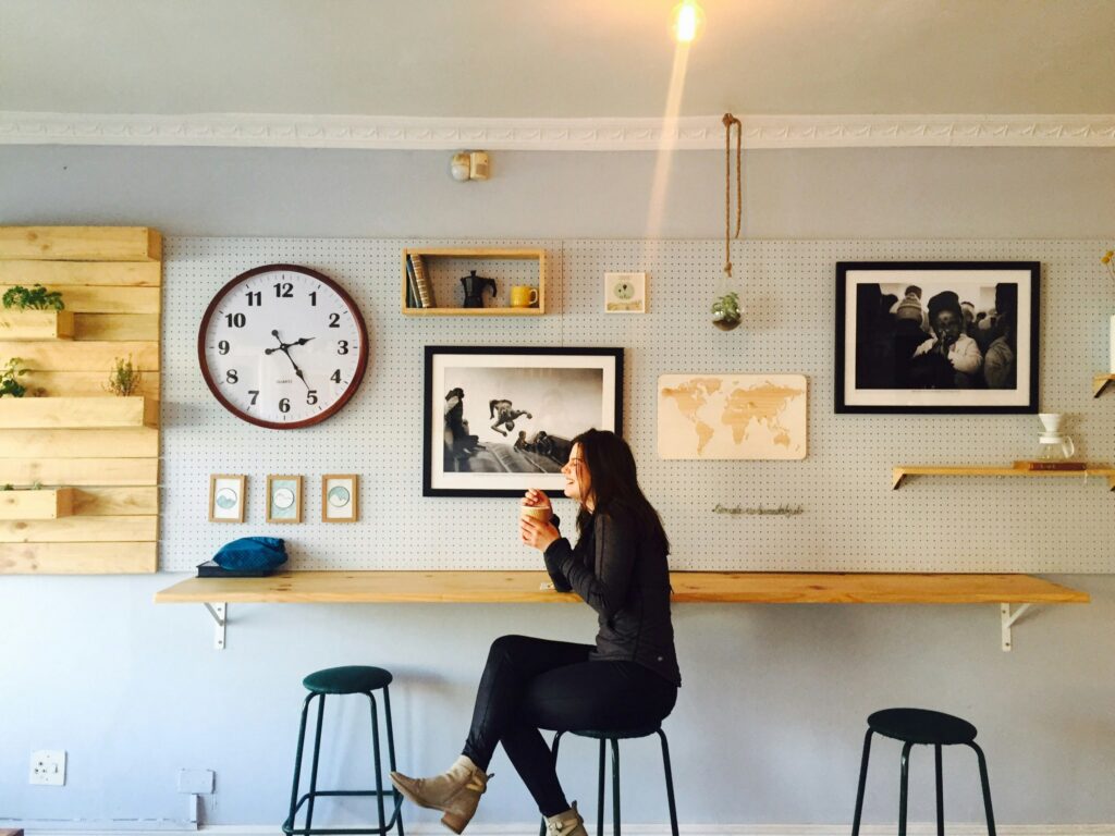 A woman sitting in a coffee shop
