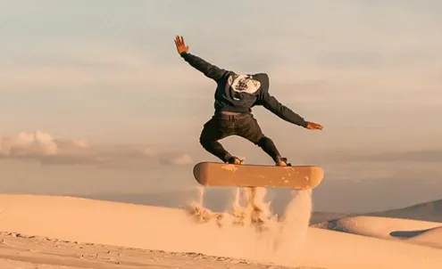 a man snowboarding