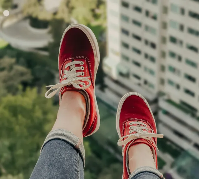 red trainers in the air