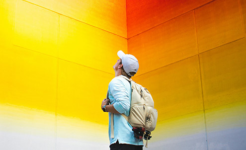 man looking at colours