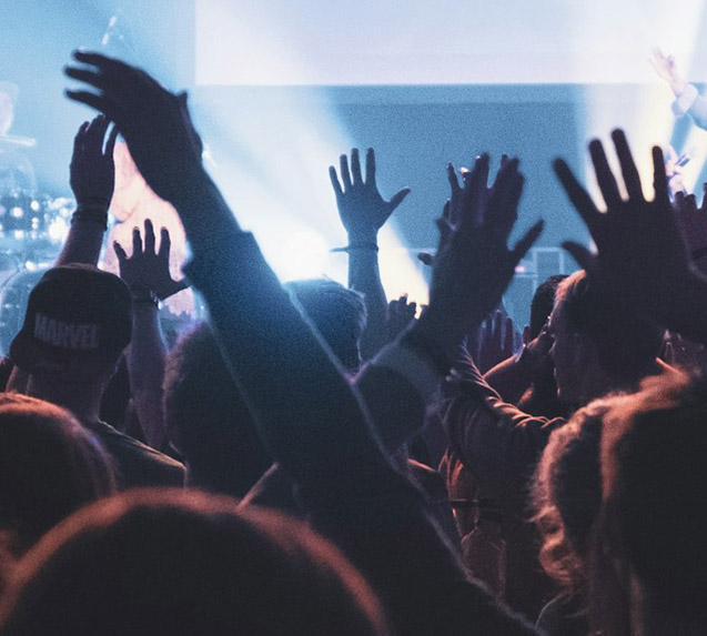 lots of people hands in the air