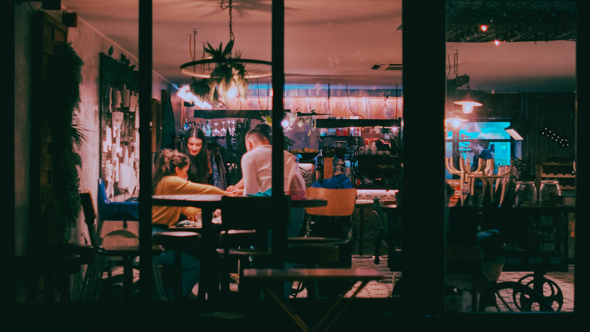 Cozy restaurant atmosphere with diners.