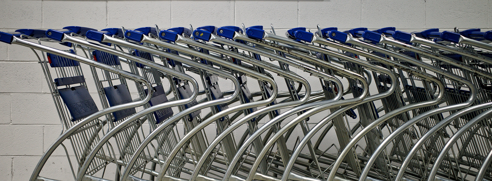 Row of shopping trolleys lined up